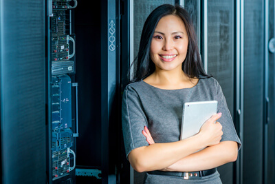 Corporate worker with server racks